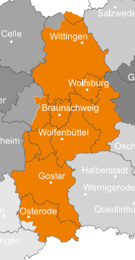 Ansprechpartner Karte der Region Braunschweig in Deutschland in Orange mit Städten wie Wolfsburg, Braunschweig, Wolfenbüttel, Goslar, Osterode und Wittingen; die umliegenden Gebiete sind in Grau dargestellt.